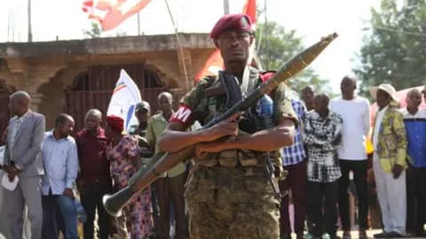 A member of the Armed Forces of the Democratic Republic of the Congo (FARDC) stands guard along a street after retaking control of multiple localities in the Ruzizi Plains, following the withdrawal of M23 rebels from Uvira territory, in Sange, South Kivu province of the Democratic Republic of Congo May 12, 2026